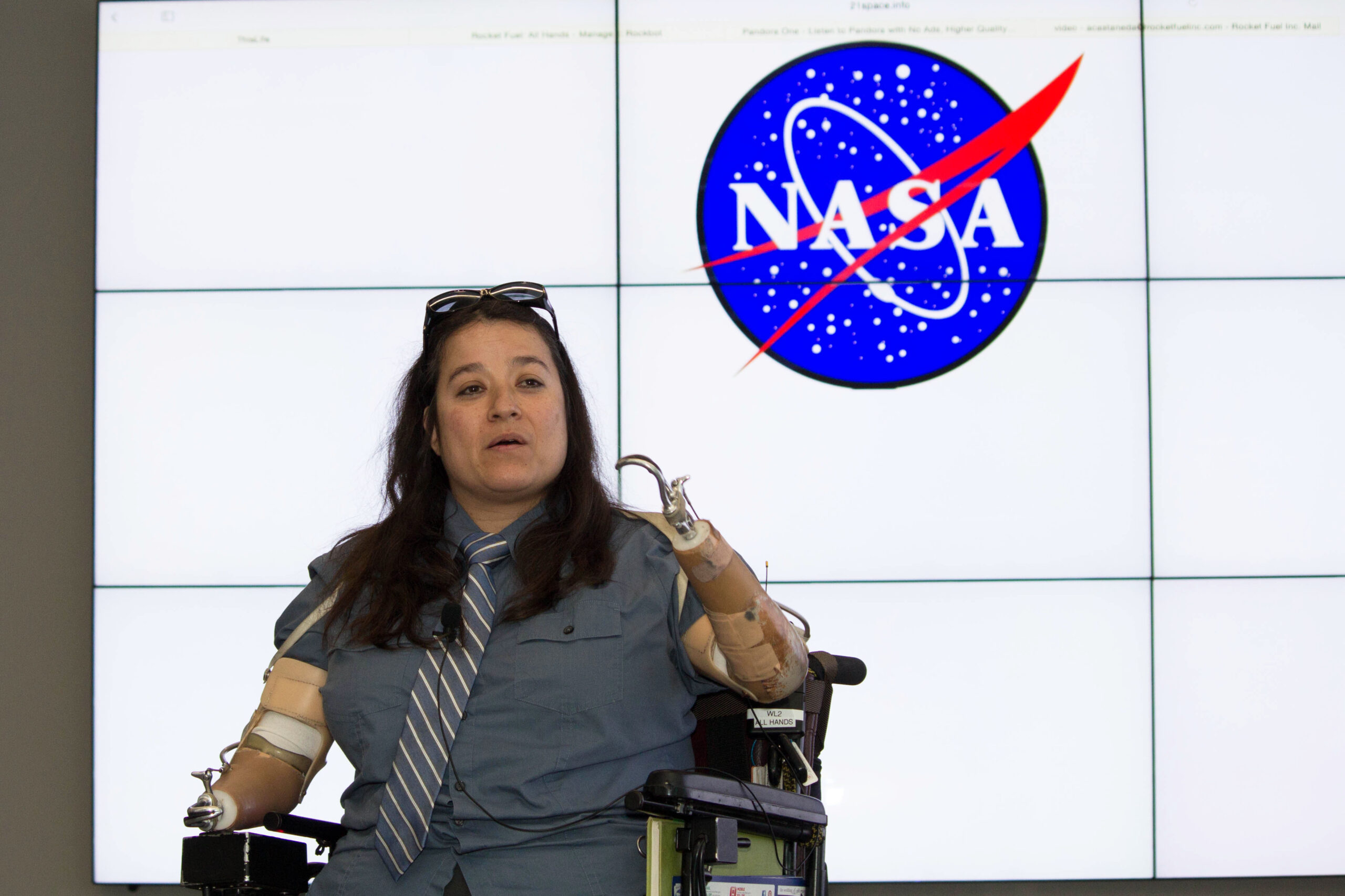 A photo of Dana Bolles on a wheel chair at the NASA office.