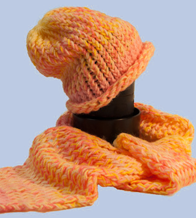 A pink, yellow, and orange scarf and hat made for babies.