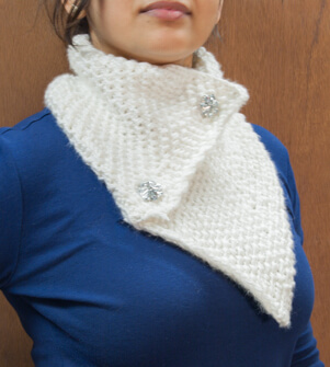 Medium weight white scarf with pearl stitching and fixed buttons.