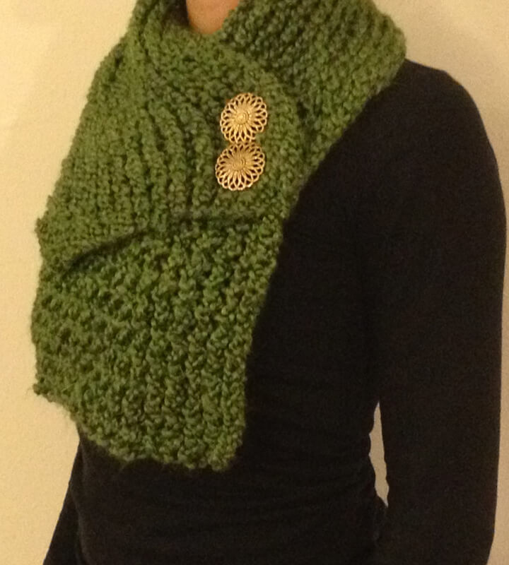 Green, lightweight scarf pullover with gold button detailing.