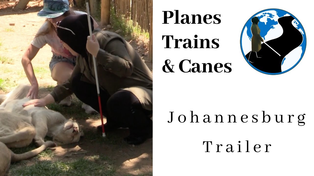 A thumbnail for Johannesburg Trailer | Planes Trains and Canes. An image of Mona petting a young lion with the aid of a safari guide.
