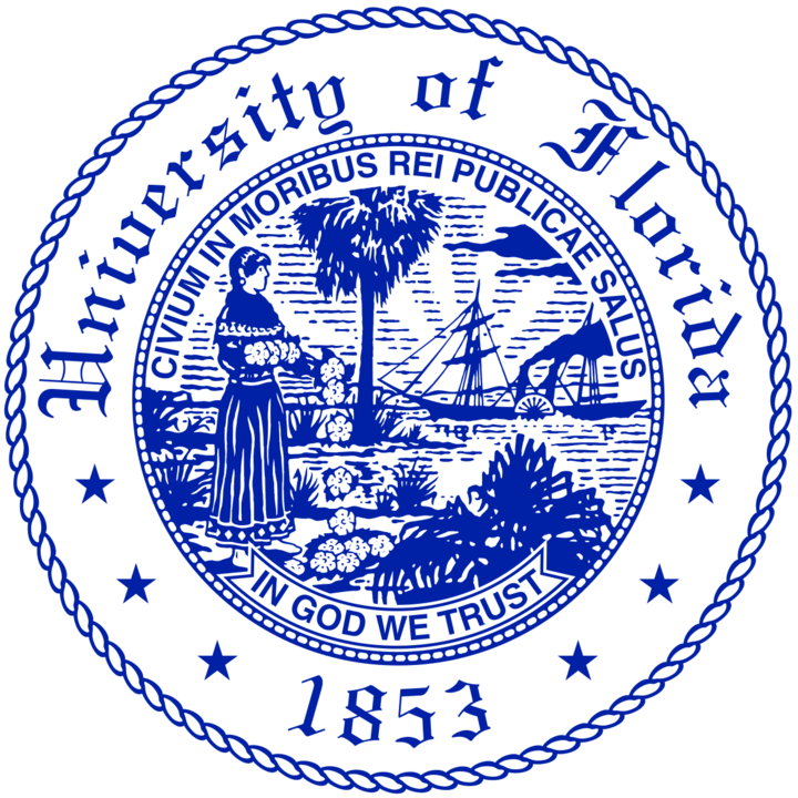 The university of Florida seal. A black and white circle with two rings. In the first inner circle is a picture of a women by a palm tree. In the background a steam ship floats on the water. In Latin at the top it reads,”Civium in Moribus Rei Publicae Salus”. On the bottom of the first ring It reads,” In God We Trust.” On the outer ring it reads “University of Florida” in stylized font. It also reads 1853.